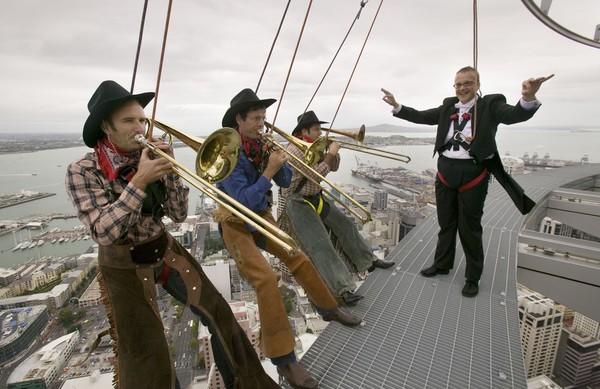 Members of trombone quartet BonaNZa and their conductor Marc Taddei, all dressed in full costume, braved the Sky Walk yesterday